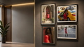 Four framed art prints featuring fashion photography of a woman in a red dress, displayed on a dark gray wall in a modern interior setting.
